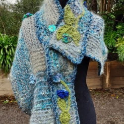 Handknitted small shawl with flowers